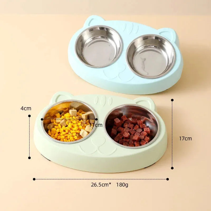 Blue macaron-shaped plastic pet feeder with two food bowls.