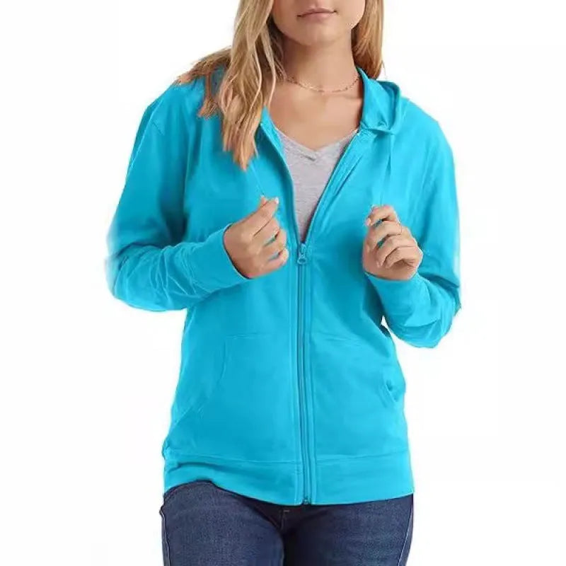 A loose fit solid colour hooded sweatshirt on a hanger, shown in one of six colour options.