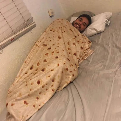 Round flannel burrito blanket with food-themed printing, showing coral fleece texture and wrap-style design