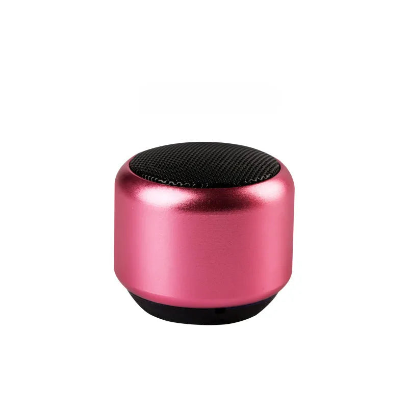 Small portable Bluetooth speaker in black, blue, gold, and pink colour options