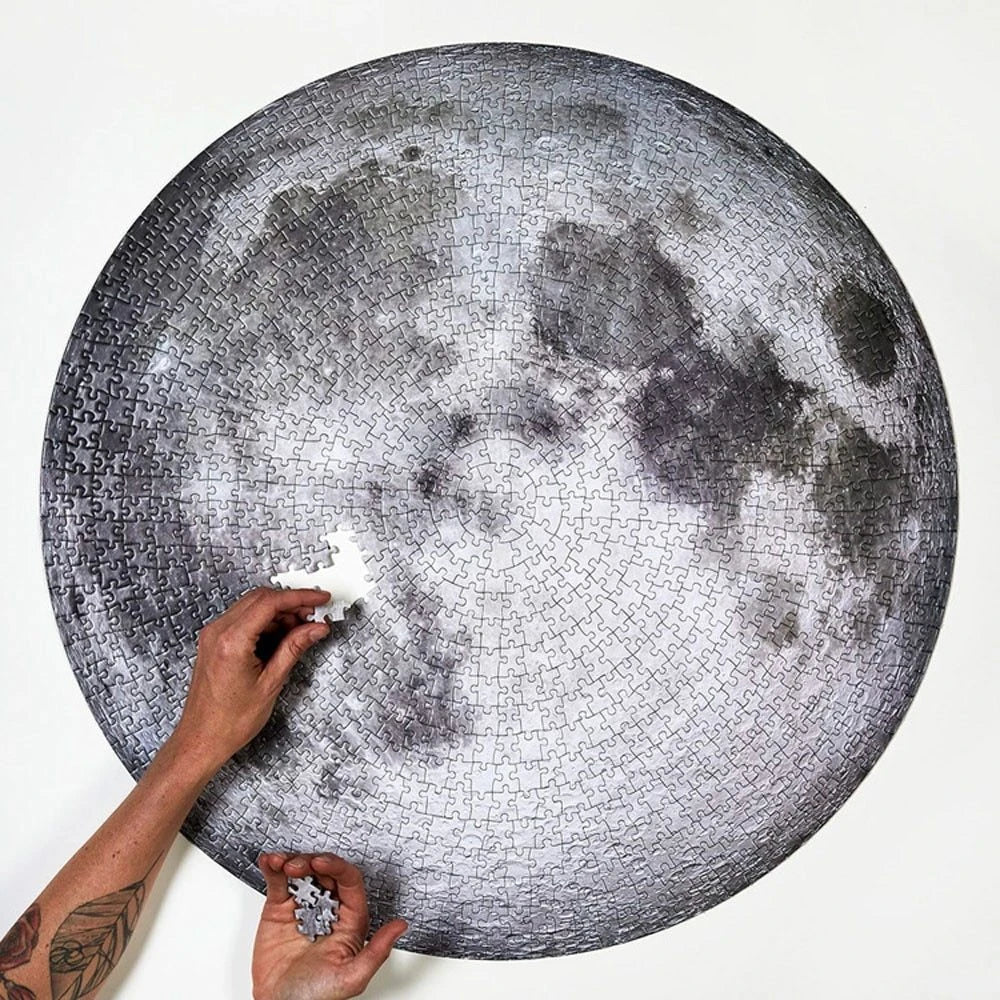 A captivating 1000-piece round jigsaw puzzle featuring the stunning images of the moon and Earth, designed to challenge and delight puzzle enthusiasts.