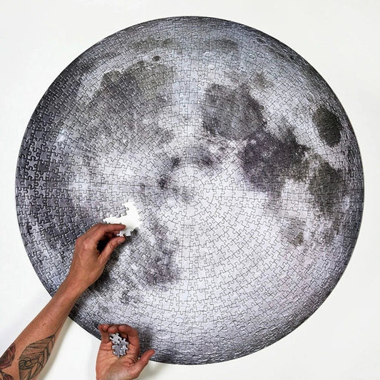 A captivating 1000-piece round jigsaw puzzle featuring the stunning images of the moon and Earth, designed to challenge and delight puzzle enthusiasts.