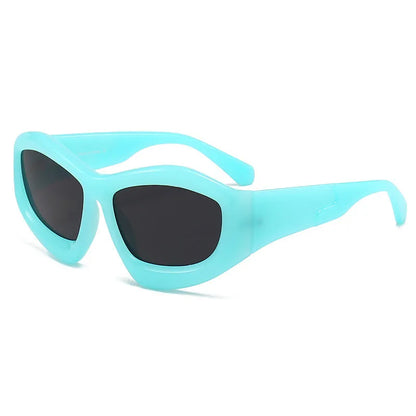 Outdoor unisex sunglasses with concave bubble lenses in black frame on a table.