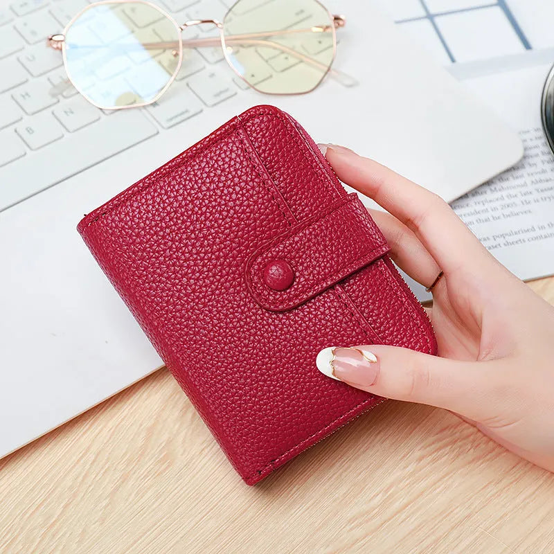 Ladies short wallet with lychee pattern texture in two-fold bifold design