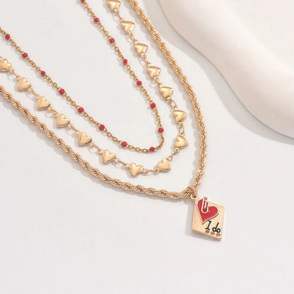 Three-layer geometric clavicle chain necklace with heart pendant on adjustable zinc alloy chain