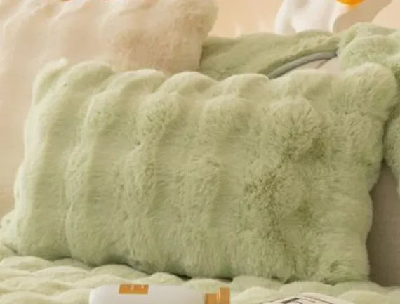 Modern solid colour sofa cushion with thickened bubble rabbit hair plush fabric on a combination sofa.