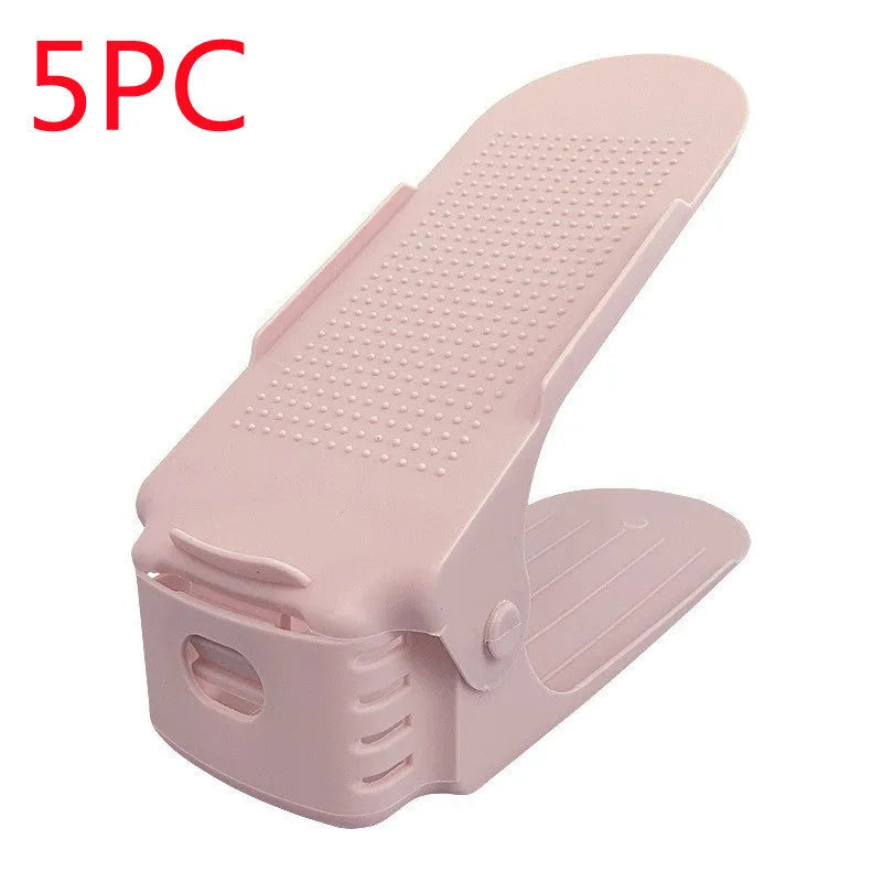 A stackable plastic shoe storage cabinet with two open shelves, shown in a choice of colours.