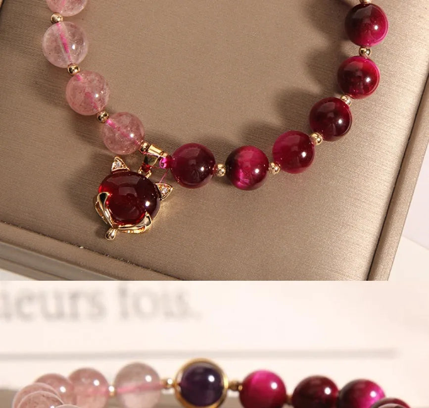 Women's elastic bracelet with strawberry crystal on a stretchy rope band.