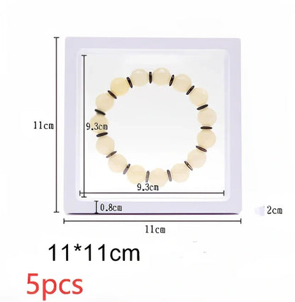 Black 11x11cm suspended 3D floating display frame holding a coin, with square base for stable collectible showcase