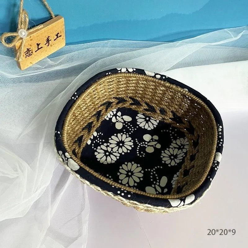 Blue square plastic storage basket with hand-woven sides for organising household items.