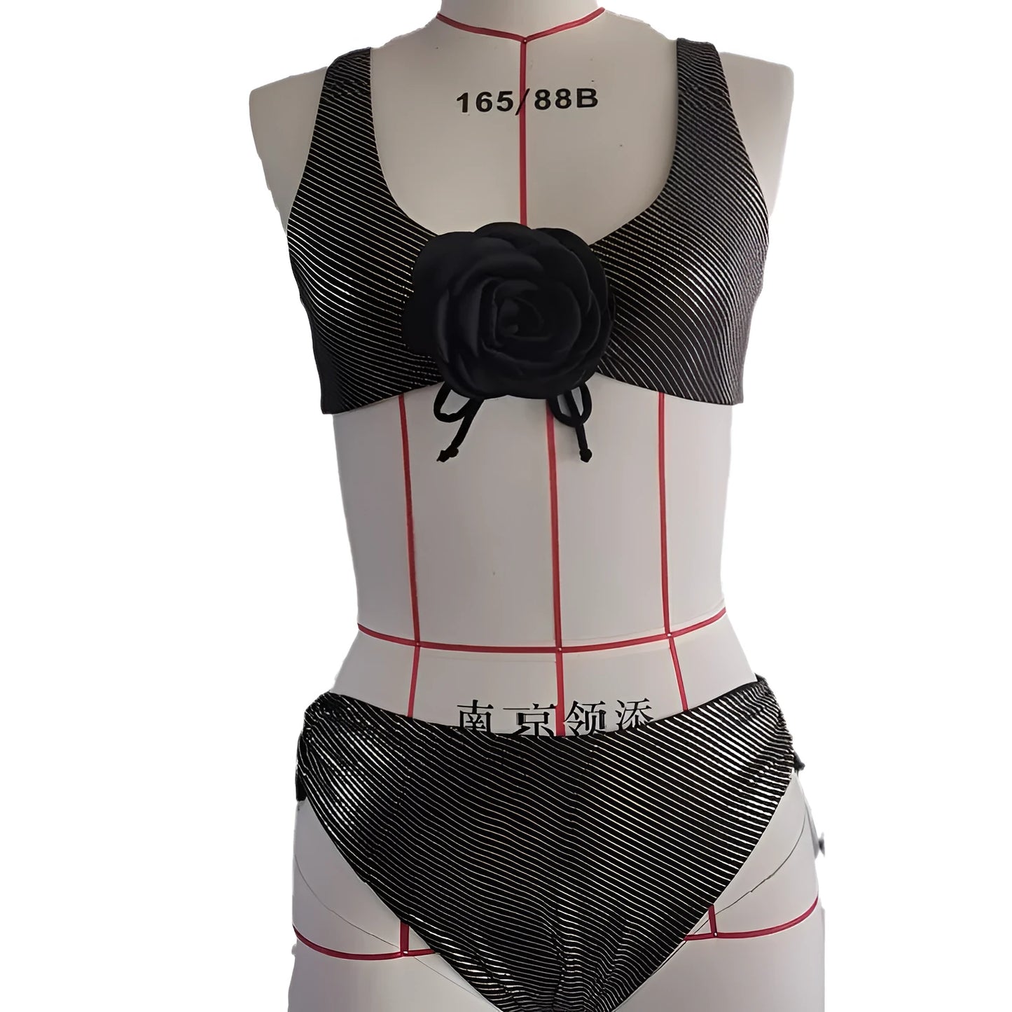 Black women's triangle swimsuit set with 3D stereo beach styling on hanger