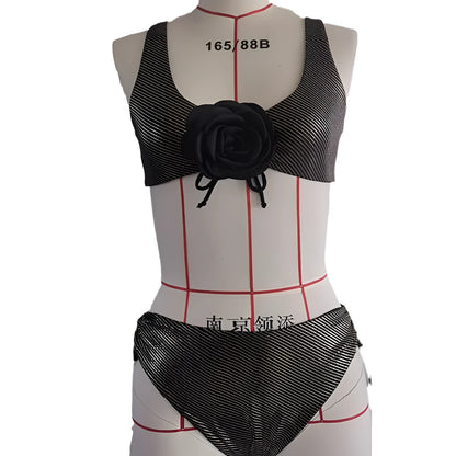 Black women's triangle swimsuit set with 3D stereo beach styling on hanger