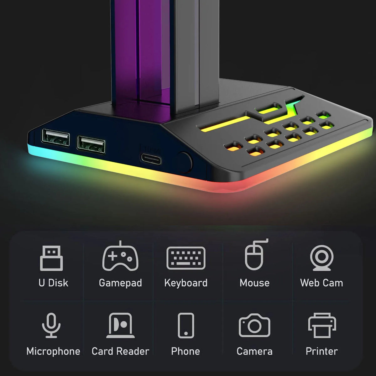 RGB colour changing headset bracket stand with dual USB ports on a desktop