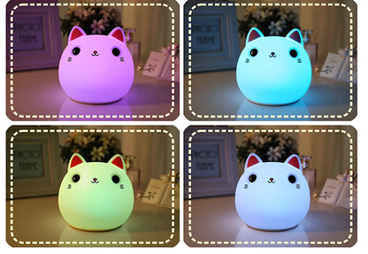 White silicone cat LED lamp with warm glow, measuring 12.5cm tall with USB charging port