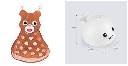 Grey or white electric whale bath toy spraying water with LED lights on a base.