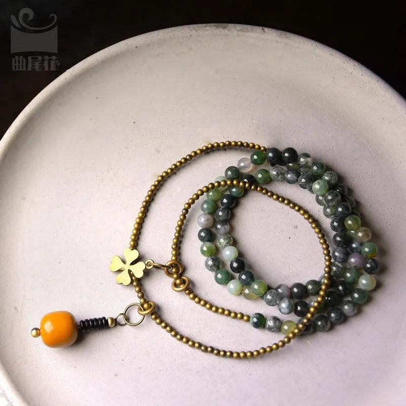 Children's multi-layered bracelet with natural crystal and semi-precious stone beads in ethnic national style design