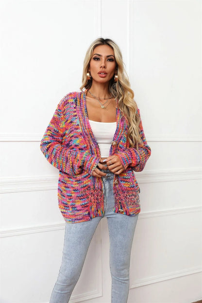 Rose Red rainbow dyed striped short cardigan knitted coat with loose fit on model.