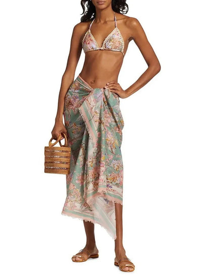 Women's creamy-white floral bikini suit with detachable skirt for beach and water sports