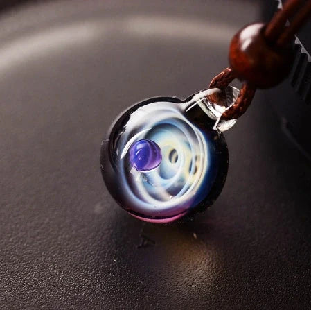 Cosmic Nebula Pendant Necklace featuring a unique blue starry sky design