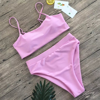 Ladies' three-point bikini swimsuit in solid colour with chest pad