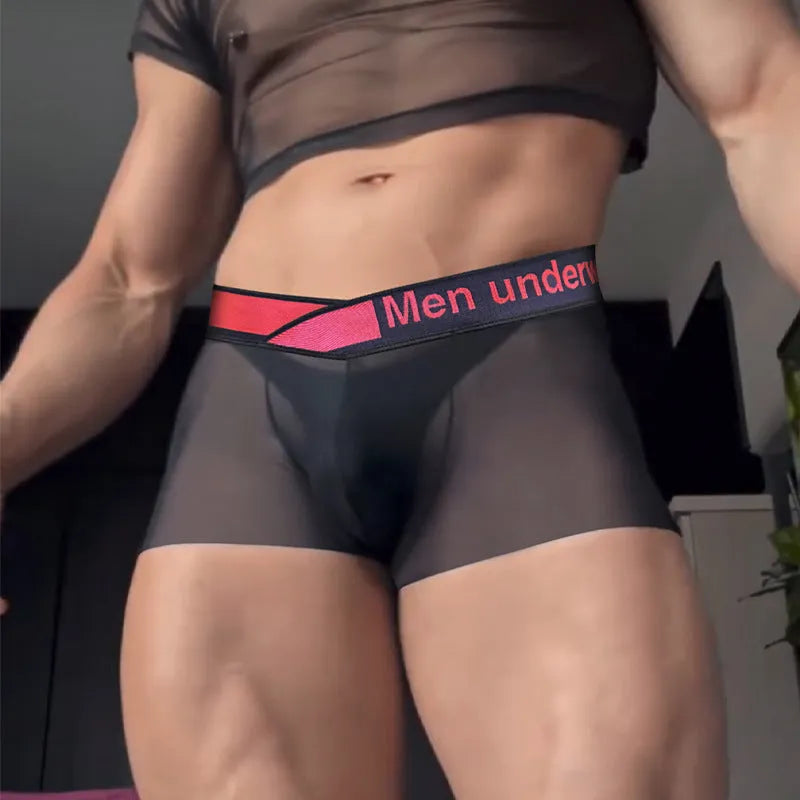 Men's seamless low waist underwear with gradient laser trim, made from comfortable breathable nylon modal fabric, suitable for sports and daily wear, available in black, red, or white colour in sizes M, L, XL, and XXL