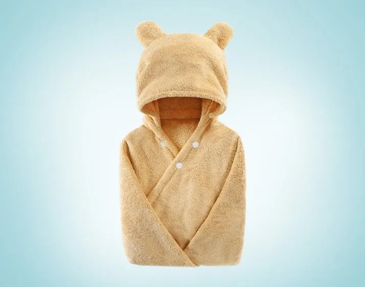 Blue hooded baby bath towel with dimensions 65cm by 110cm laid flat.