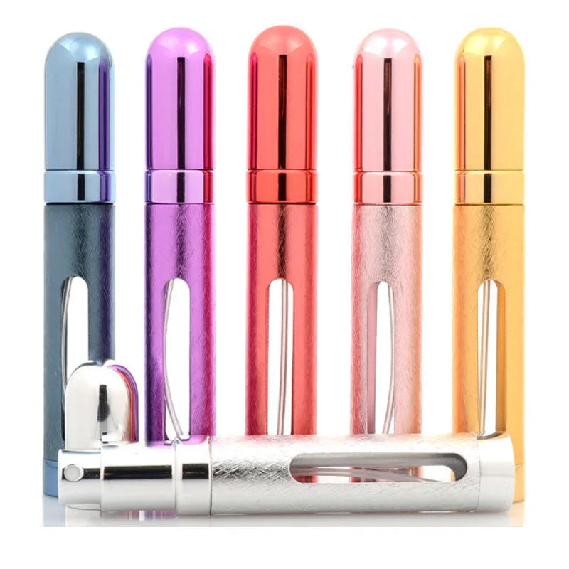 Slim 12ml aluminium travel perfume bottle with glass liner in bullet shape, shown in various colours.