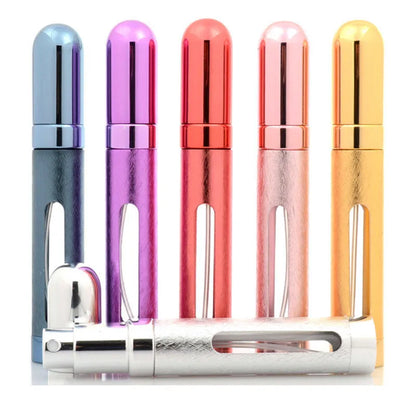 Slim 12ml aluminium travel perfume bottle with glass liner in bullet shape, shown in various colours.