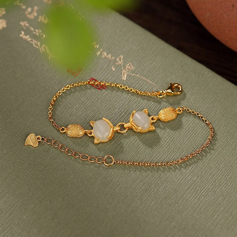 Women's bracelet fashioned from 925 sterling silver with a jade or jasper centrepiece measuring about 6mm wide and 8mm high, featuring a 17cm chain length plus a 3cm extension for an adjustable retro-inspired look