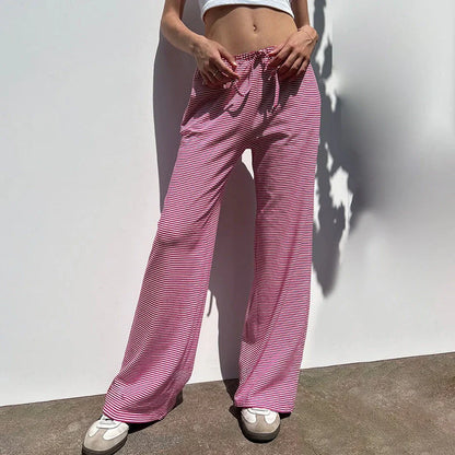 Stylish women's striped wide-leg trousers with lace-up detail in various colors