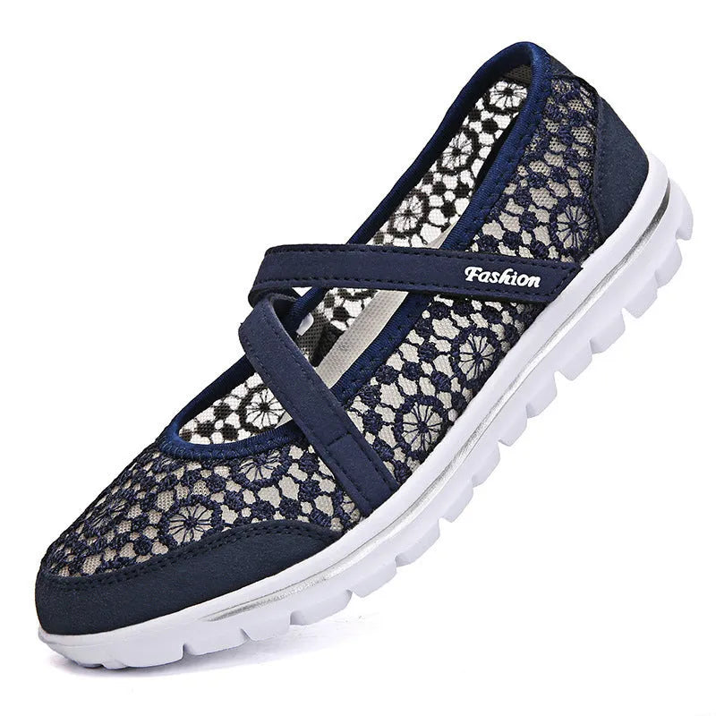 Women's beige lace-up casual flat shoes with a breathable mesh upper and round toe.