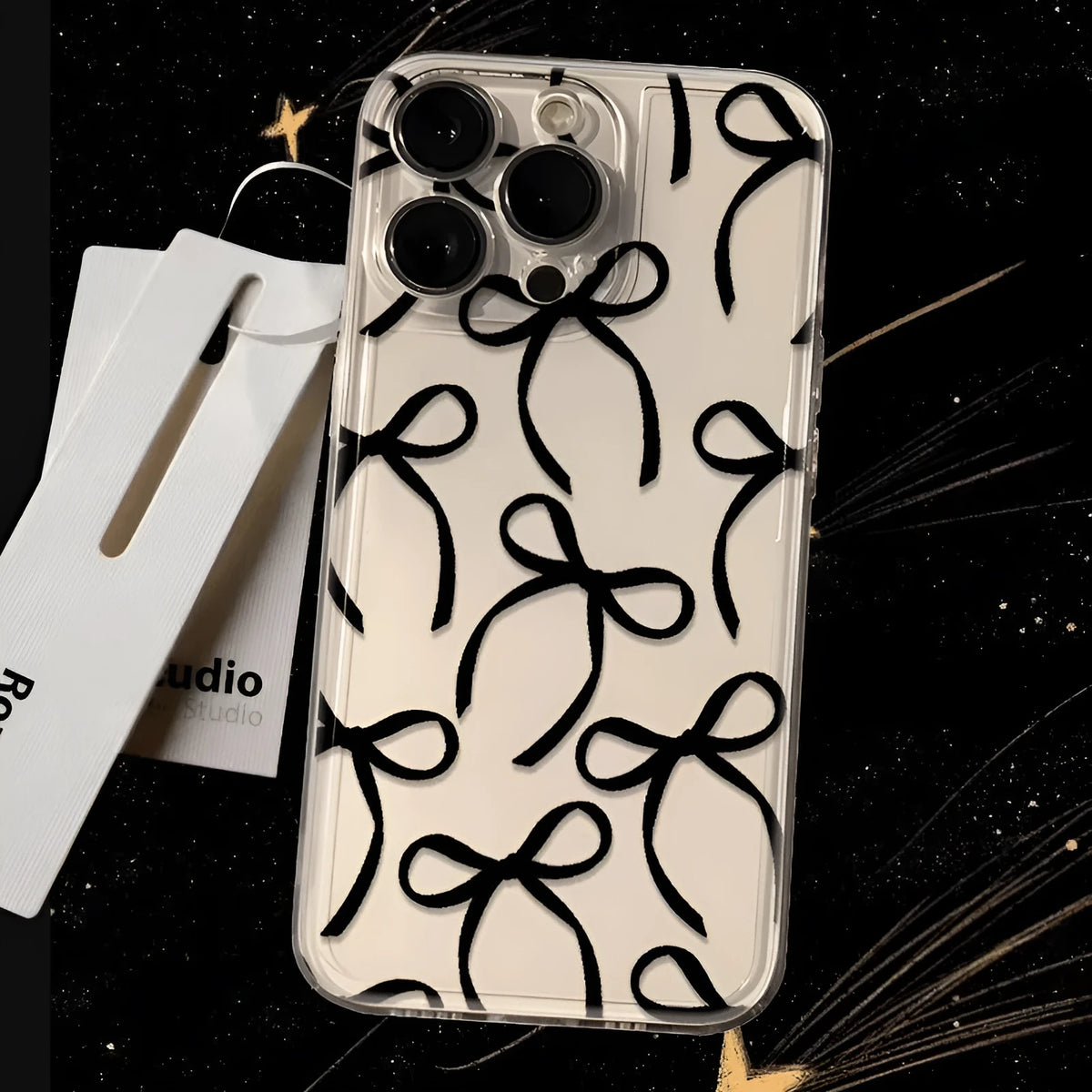 Black ribbon bow transparent soft TPU phone case for iPhone with anti-fall function and sprayed finish.