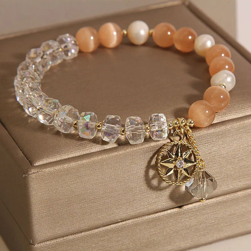 Orange eight Awn star bracelet with gold-plated inlay and artificial gemstones