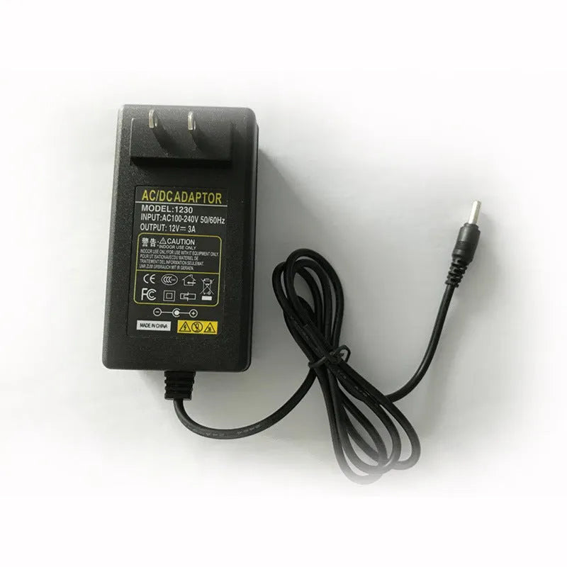 Purple gold and black portable thermoelectric car cooler and warmer for GM vehicles with DC 12V plug.