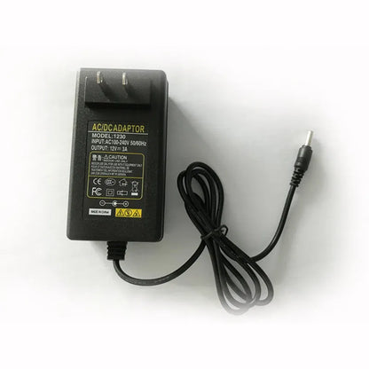 Purple gold and black portable thermoelectric car cooler and warmer for GM vehicles with DC 12V plug.