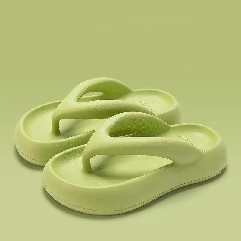 Solid colour thick-soled flip-flops with a bow on the strap, shown in multiple colour options.