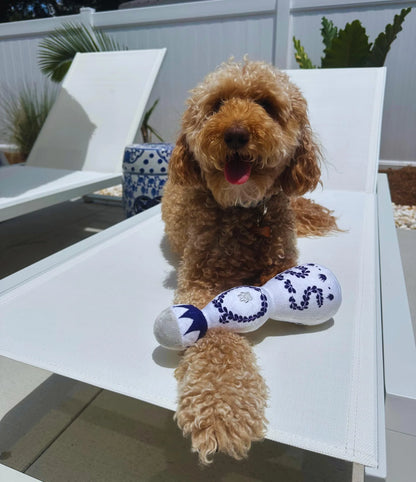 Red and white tequila bottle plush dog toy with squeaker, 26 cm tall
