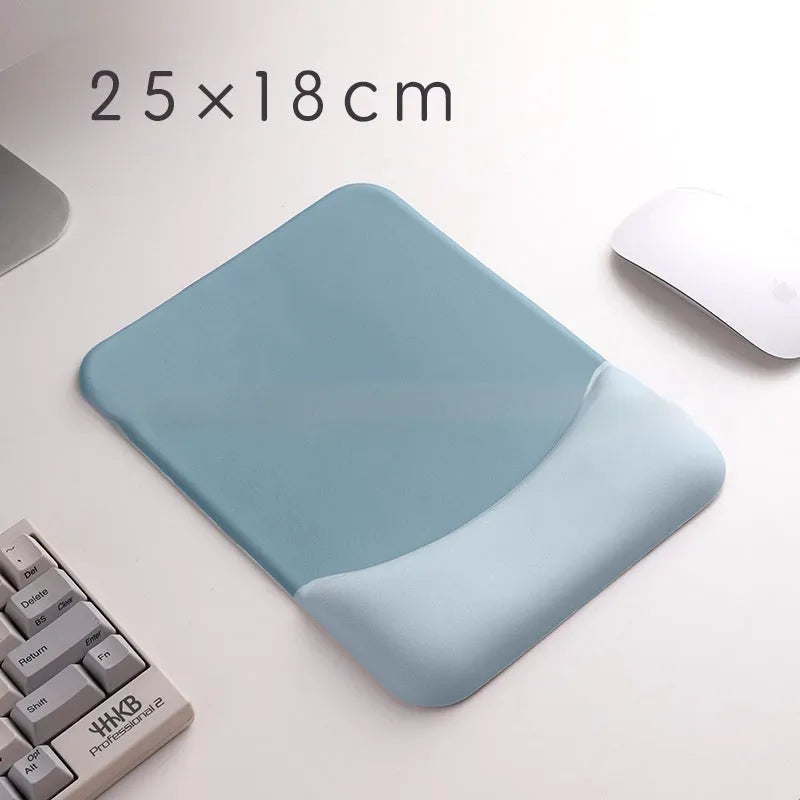Square cloth-covered silica gel wrist rest mouse pad on a desk.