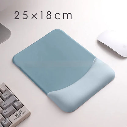 Square cloth-covered silica gel wrist rest mouse pad on a desk.