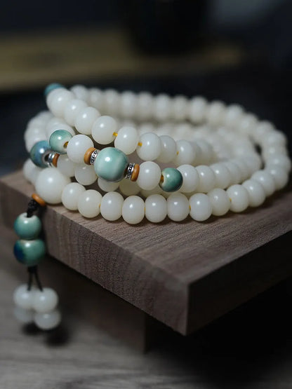 White jade bodhi root oblate bead bracelet with 108 beads in two sizes