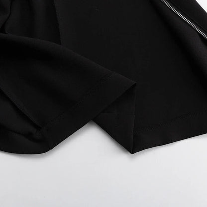 Elegant crossbody dress with zipper detail, high-waisted silhouette, and long sleeves in a solid black colour