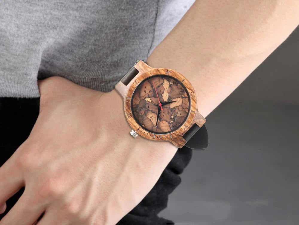 Casual wooden men's watch with a broken leaf wooden dial, leather strap, and stainless steel clasp