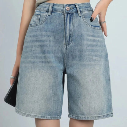 High-waist knee-length denim shorts for women, featuring a flattering silhouette and versatile casual style.
