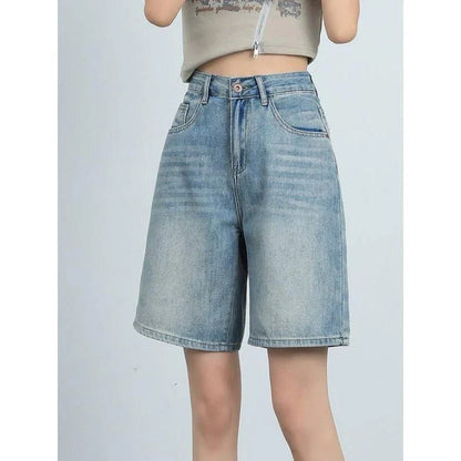 High-waist knee-length denim shorts for women, featuring a flattering silhouette and versatile casual style.