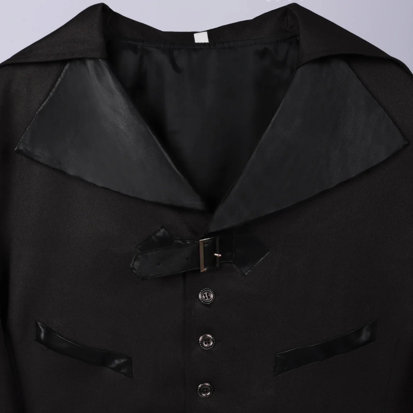 A model wearing a green Halloween-themed dovetail punk gothic coat with a sophisticated, edgy design