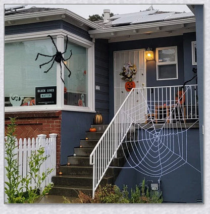 Webby Giant Halloween Spider Web - Massive, stretchy black and white web for creating a spooky, haunting atmosphere