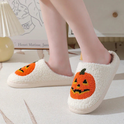 Cozy pumpkin cartoon slippers with soft suede uppers and plush cotton linings for comfortable indoor wear