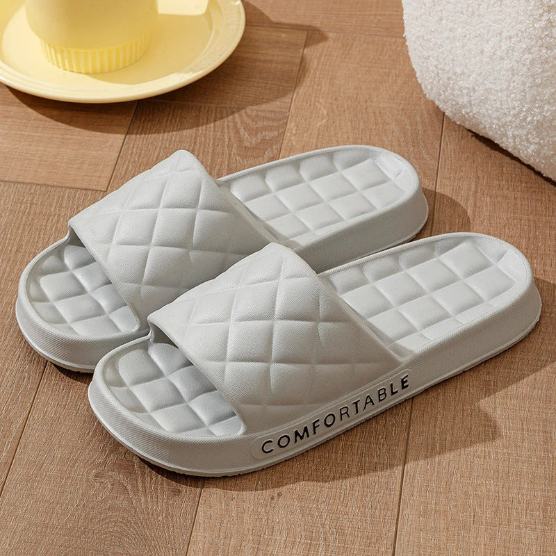 Stylish plaid slippers with soft, cushioned soles for comfortable indoor wear