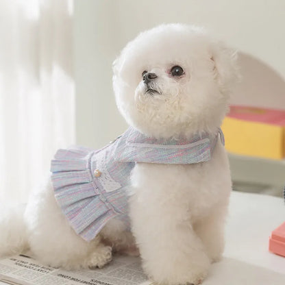 Purple and pink polyester pet clothing for a cat or small dog on a white background.