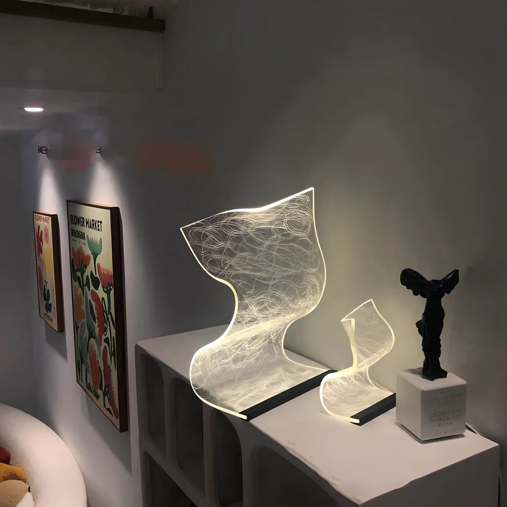 USB-powered bedside lamp with three colour settings and compact design
